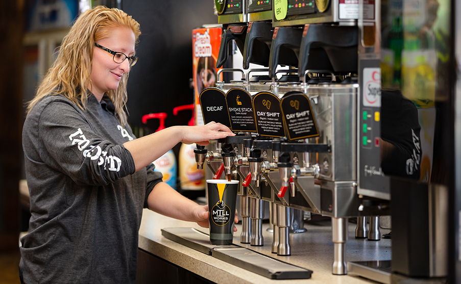 Customer getting coffee